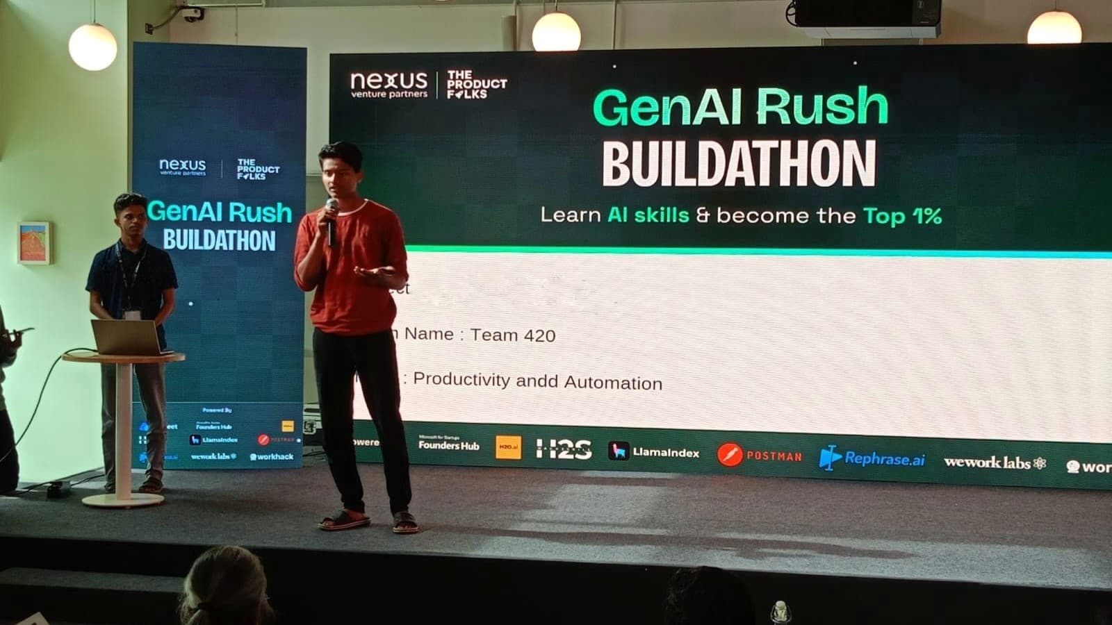 Me speaking on stage at Gen AI buildathon in banglore